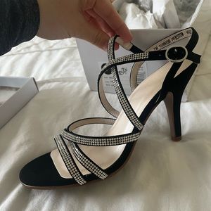 NWT David’s Bridal Preston black formal heels. Size 7. Never been worn!